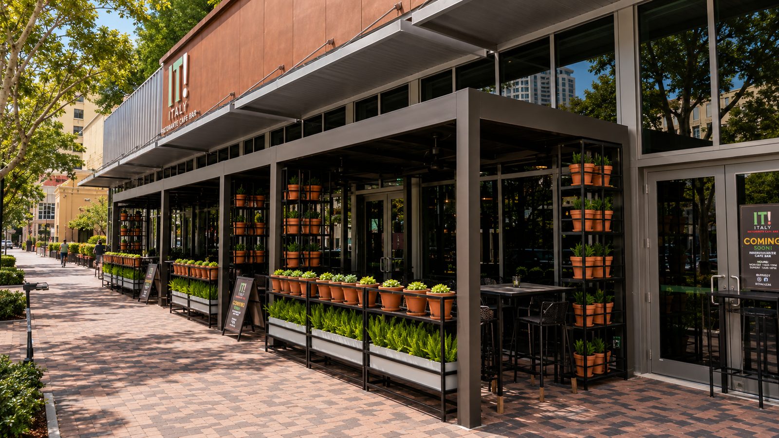 Aluminum canopy and planter framework along a downtown restaurant's street-side dining terrace